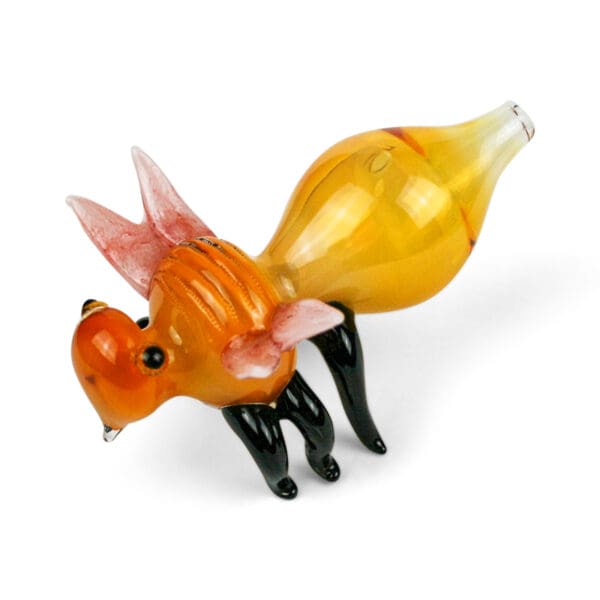 Glass pipe in the shape of a flying bee.